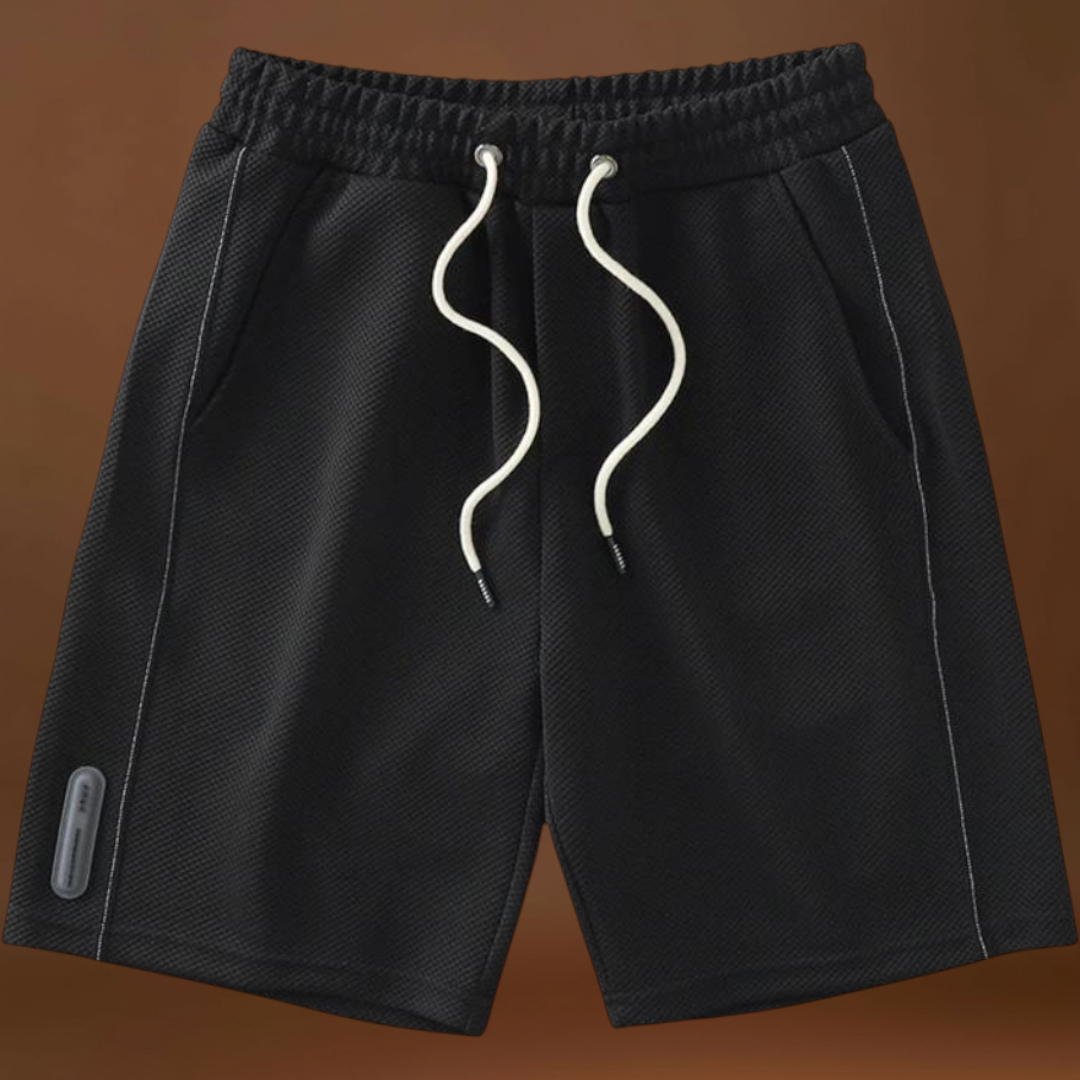 Rövidnadrág - Poliészter keverék, térd fölötti szabás és könnyű mozgás