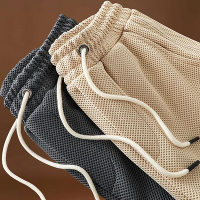 Rövidnadrág - Poliészter keverék, térd fölötti szabás és könnyű mozgás