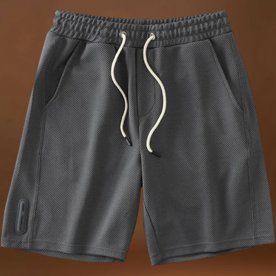 Rövidnadrág - Poliészter keverék, térd fölötti szabás és könnyű mozgás