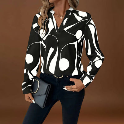 Lelia - Elegáns, hosszú ujjú blúz hegyes dekoltázzsal