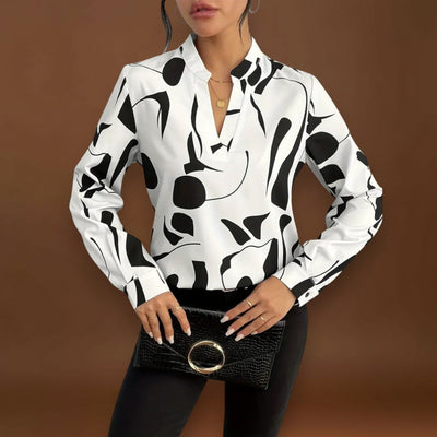 Lelia - Elegáns, hosszú ujjú blúz hegyes dekoltázzsal